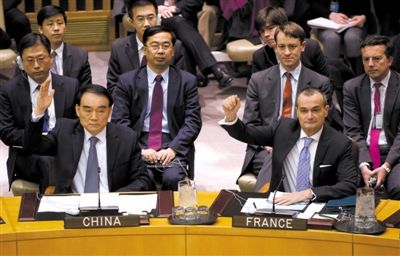 1月22日，紐約，中國常駐聯(lián)合國代表李保東舉手贊成通過對朝鮮制裁決議。