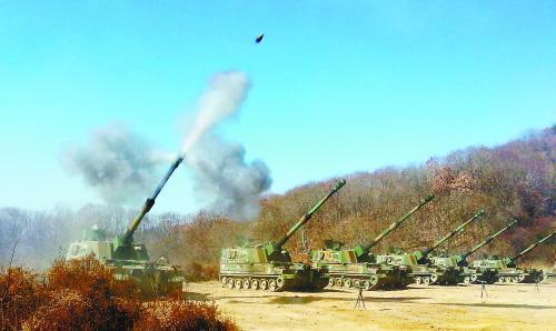 延坪島炮擊事件3周年之際，朝韓間口水仗不斷。圖為韓軍21日舉行應(yīng)對挑釁訓(xùn)練。